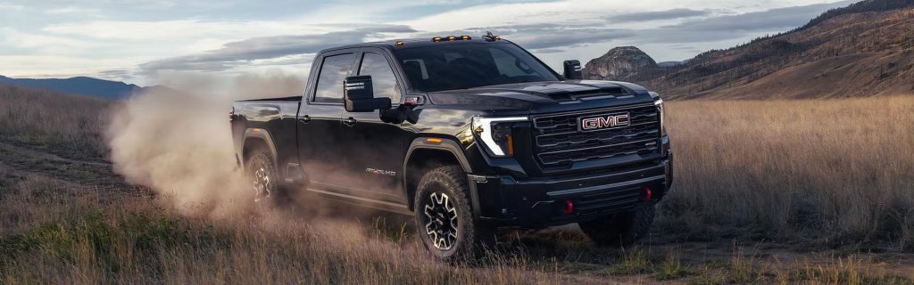 2026 GMC Sierra 2500 off-road truck equipped for rugged terrain, highlighting power and performance at Country Club GMC in Oneonta, NY.